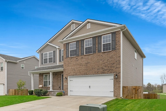 view of front of property with a front lawn and a garage