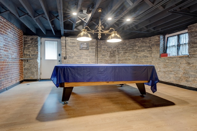 game room with wood-type flooring and billiards