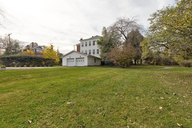 view of yard with a garage