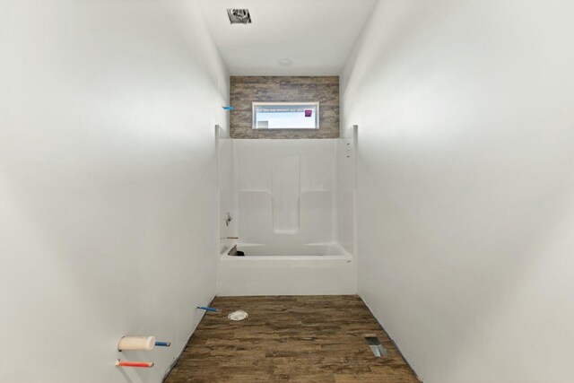 bathroom featuring wood-type flooring