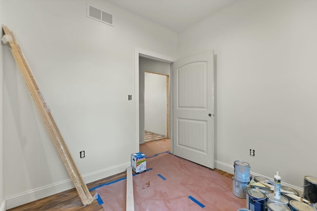 interior space with hardwood / wood-style floors