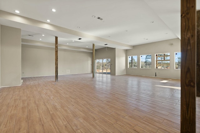 basement featuring light hardwood / wood-style flooring