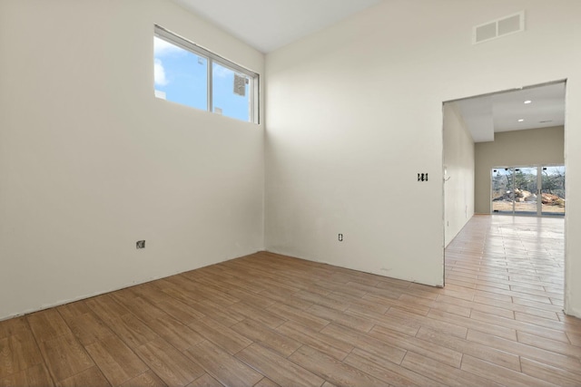 empty room with light wood-type flooring