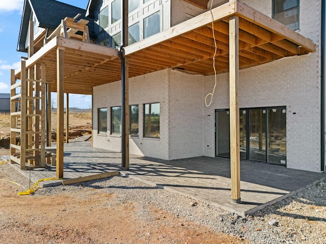 back of house with a patio