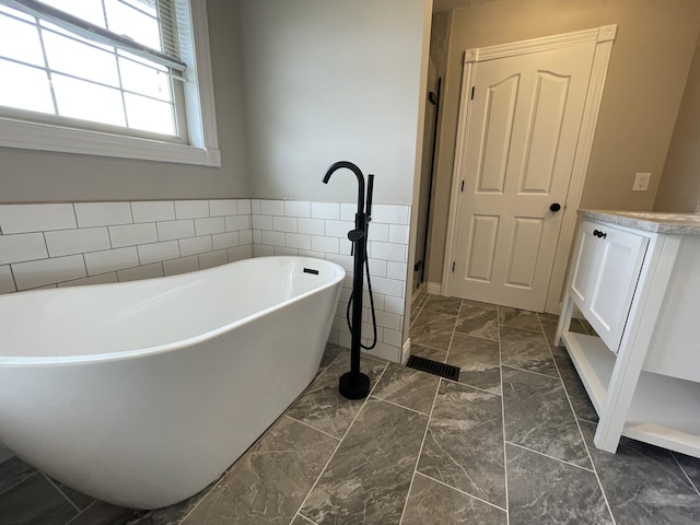 bathroom with a washtub