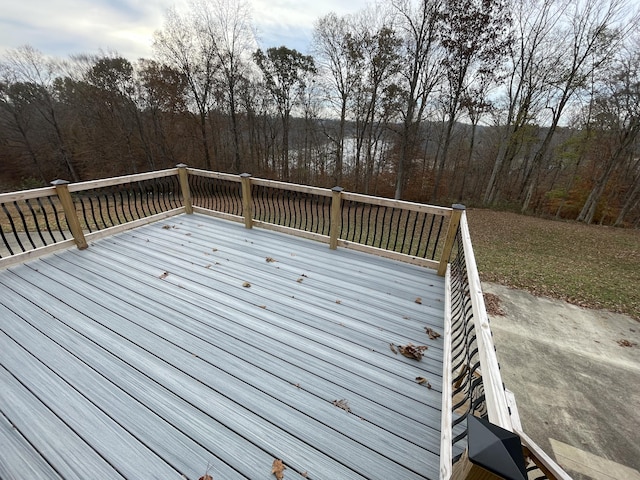 deck featuring a lawn