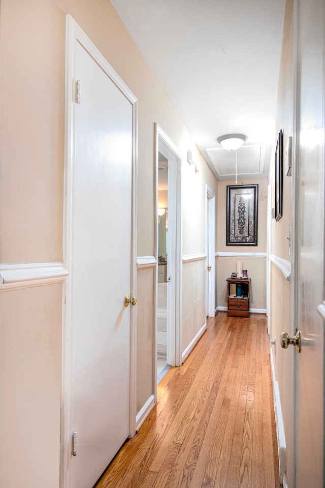 hallway with light wood-type flooring