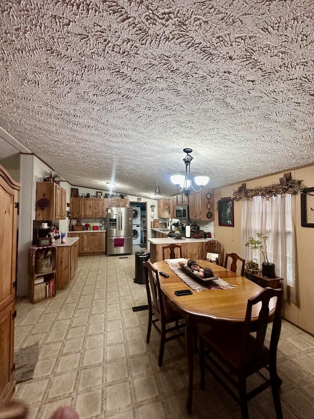 dining room with a textured ceiling