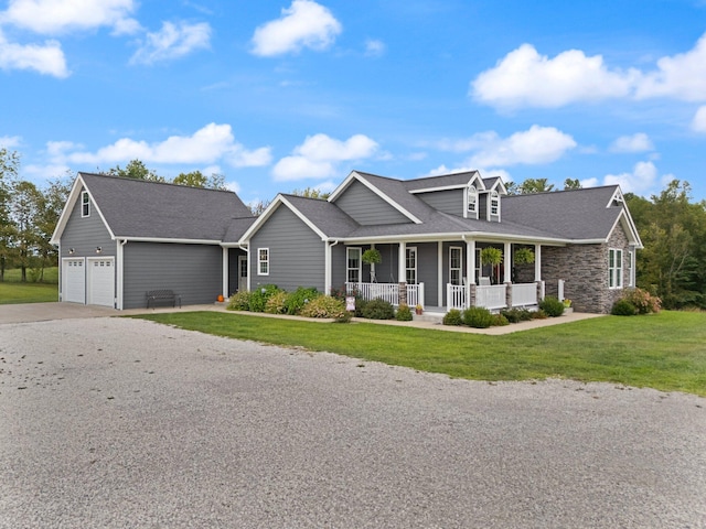 view of front of property with a porch and a front yard