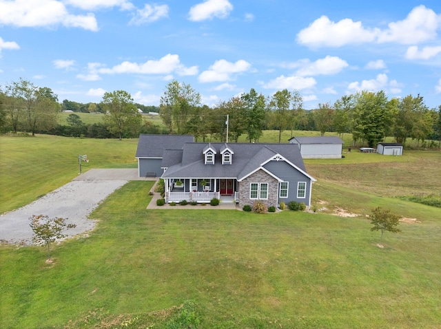 view of front of property featuring a front lawn and a porch