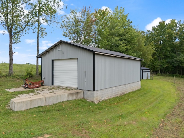 garage with a lawn