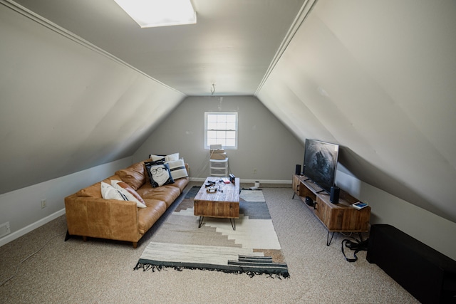 carpeted living room featuring vaulted ceiling