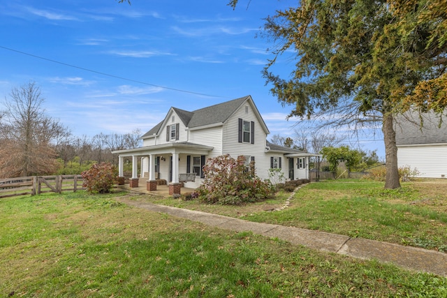 view of front of home featuring a front lawn and a porch