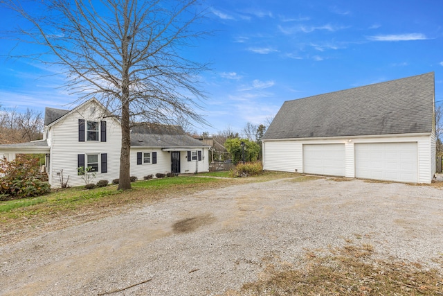 view of side of property featuring a garage