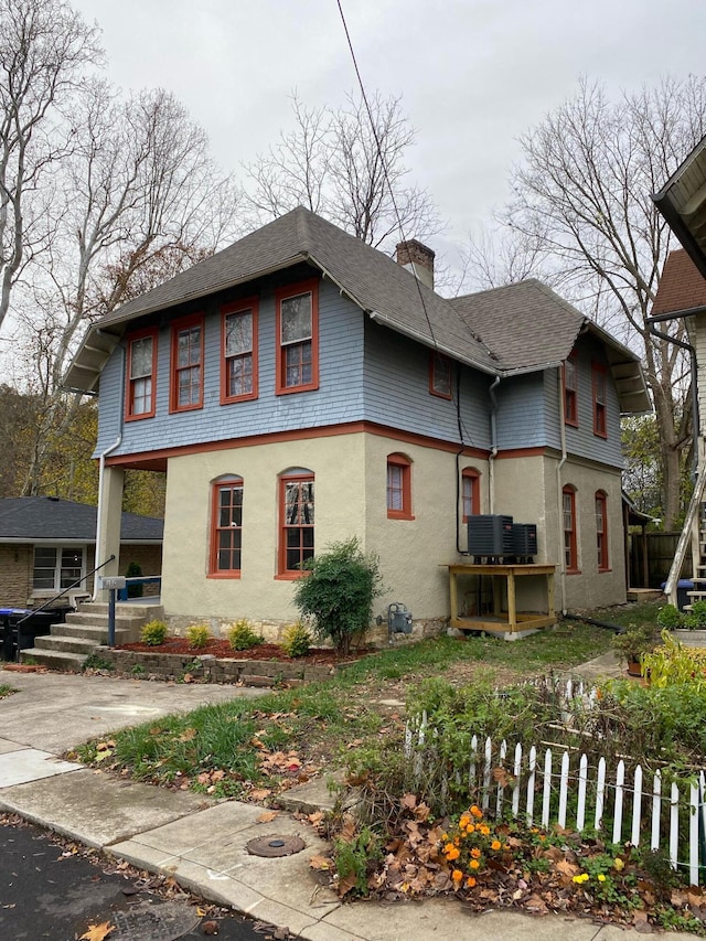 view of home's exterior featuring cooling unit