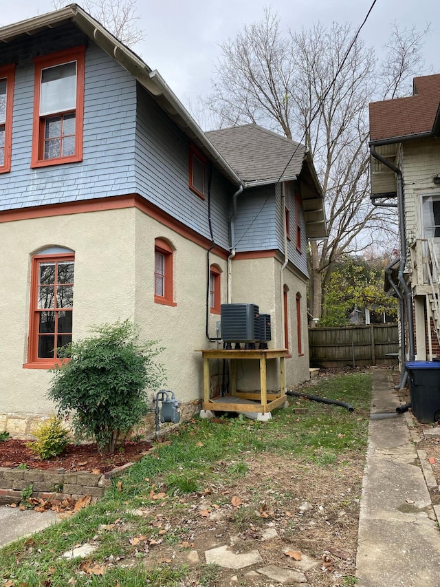 view of property exterior with central air condition unit