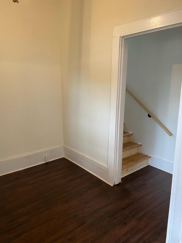 stairway featuring hardwood / wood-style floors