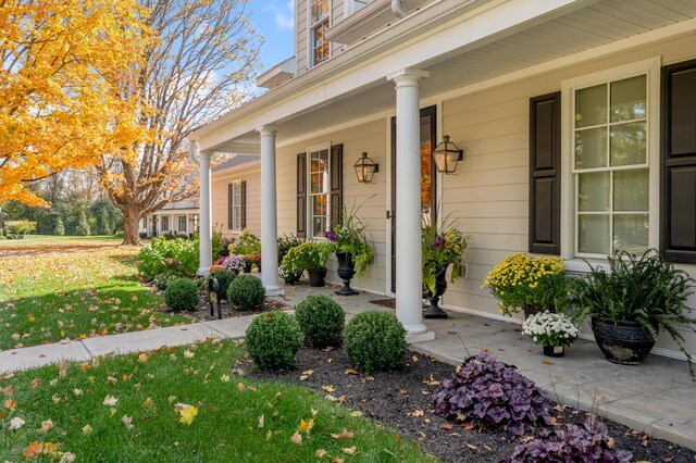 entrance to property with covered porch