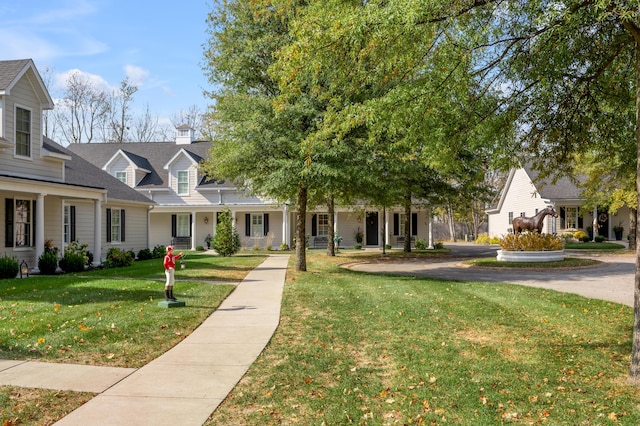 1602 Winners Cir # 41, Lexington, KY 40513 - cape cod-style house with a front yard and a porch