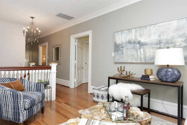 1602 Winners Cir # 41, Lexington, KY 40513 - living room with a chandelier, crown molding, and light wood-type flooring
