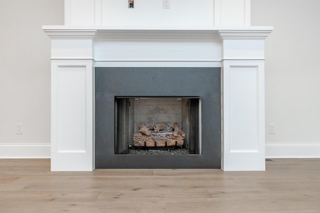 1602 Winners Cir # 41, Lexington, KY 40513 - detailed view of a fireplace and wood finished floors