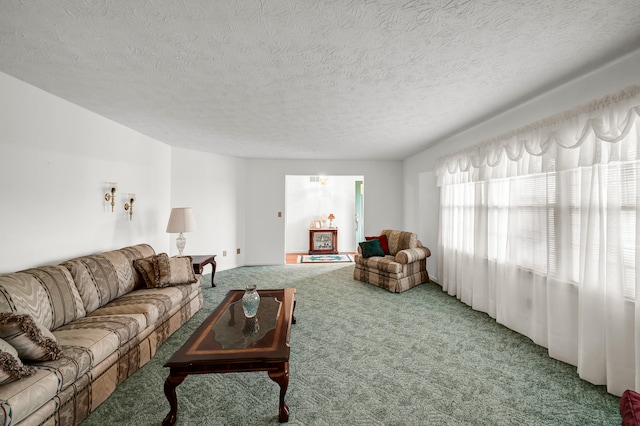 living room with carpet and a textured ceiling