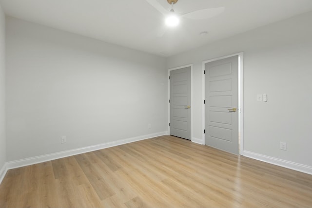 unfurnished bedroom featuring light wood-type flooring and ceiling fan