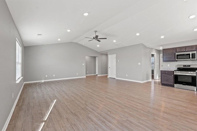 unfurnished living room featuring lofted ceiling, light hardwood / wood-style flooring, and ceiling fan