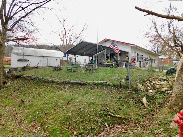 view of yard with a carport