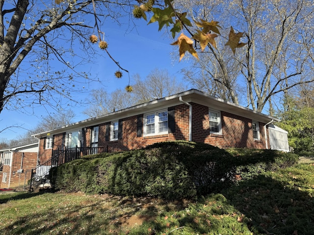 ranch-style home with brick siding