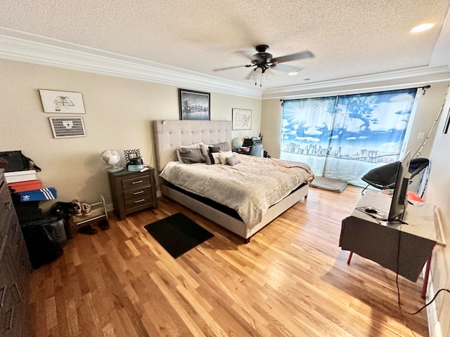 bedroom featuring access to exterior, ornamental molding, a textured ceiling, ceiling fan, and light hardwood / wood-style floors