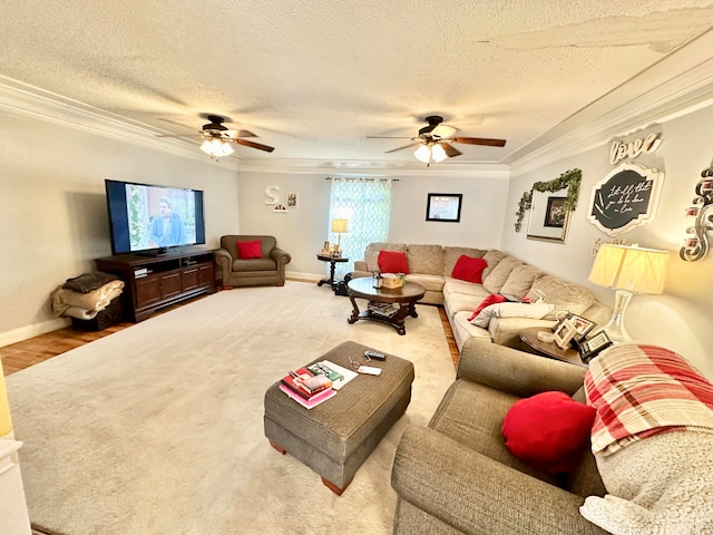 carpeted living room featuring a textured ceiling, ceiling fan, and crown molding