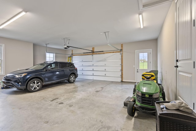 garage featuring a garage door opener