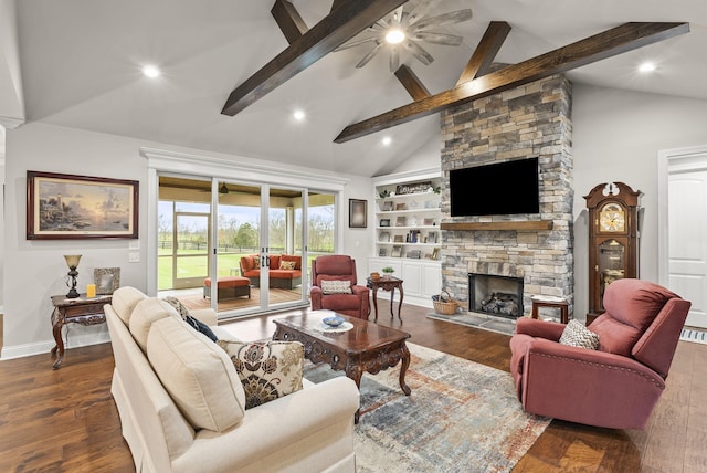 living room featuring a stone fireplace, ceiling fan, dark hardwood / wood-style flooring, and beamed ceiling