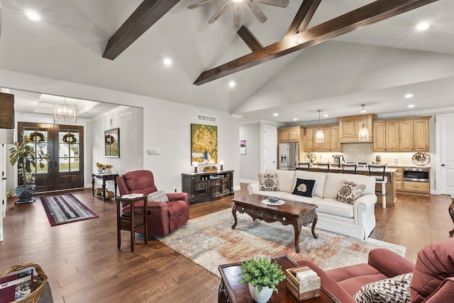 living room with french doors, beamed ceiling, dark wood-type flooring, and high vaulted ceiling