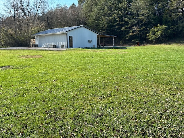 view of yard featuring a carport