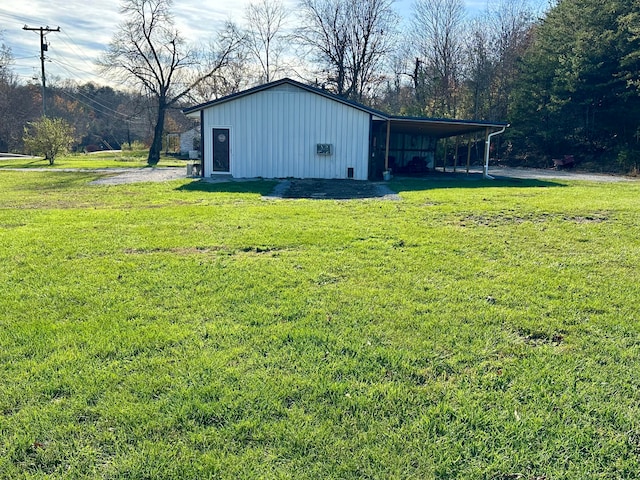 exterior space with a carport and an outbuilding