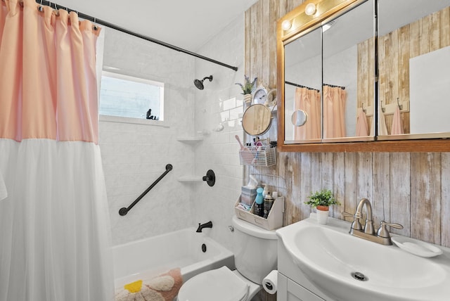 full bathroom with shower / bath combo, vanity, and toilet