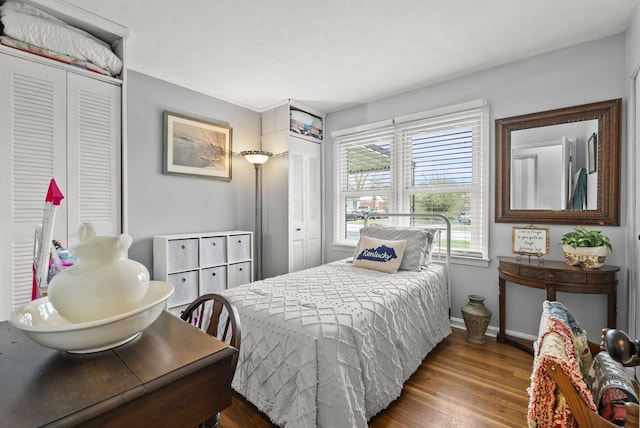 bedroom featuring dark hardwood / wood-style floors