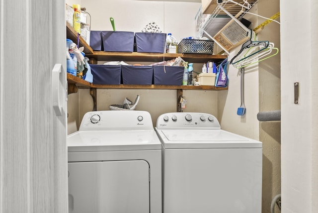 laundry room with separate washer and dryer