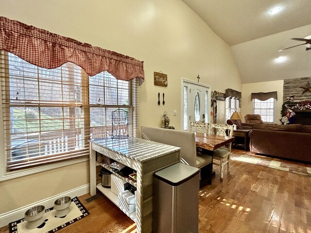 kitchen with appliances with stainless steel finishes, light hardwood / wood-style floors, tasteful backsplash, and sink