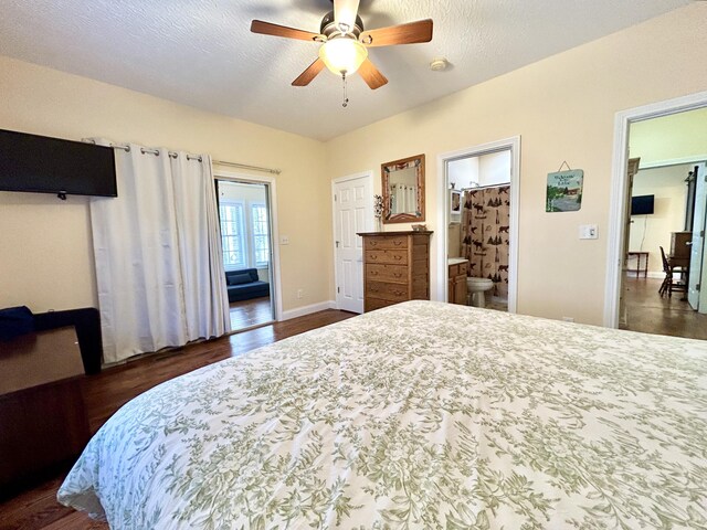 bedroom featuring ceiling fan and dark wood-type flooring