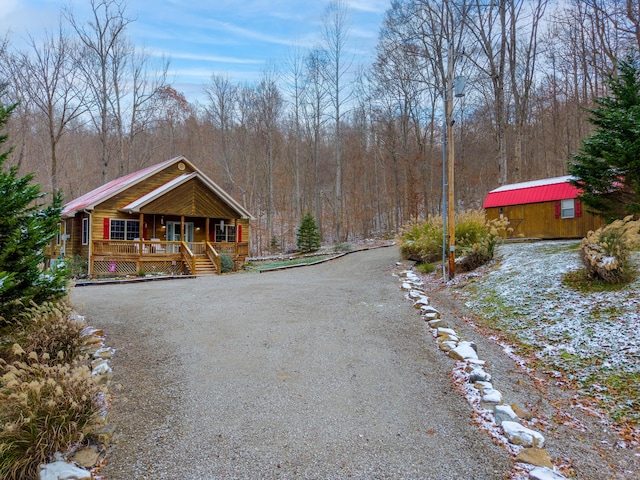 view of front of home featuring covered porch