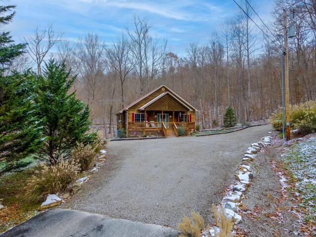 view of front of house featuring covered porch and central air condition unit