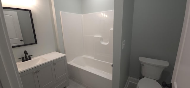 full bath featuring shower / bathtub combination, toilet, and vanity