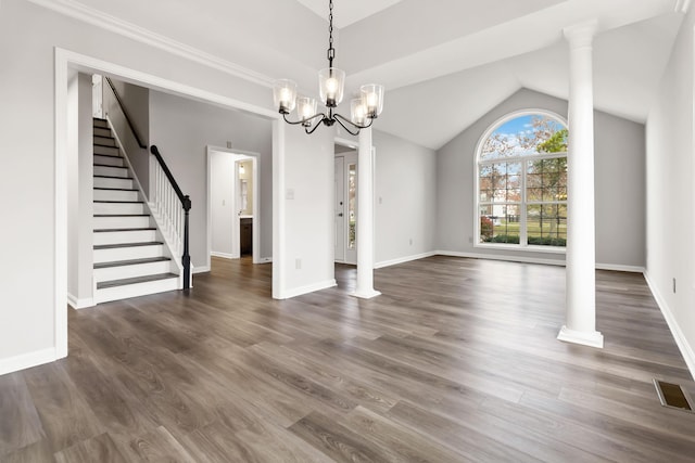 unfurnished dining area featuring visible vents, baseboards, stairway, lofted ceiling, and dark wood-style floors