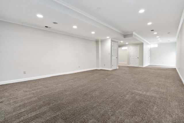 basement featuring ornamental molding, recessed lighting, carpet, and baseboards