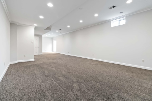 basement with recessed lighting, visible vents, baseboards, ornamental molding, and carpet