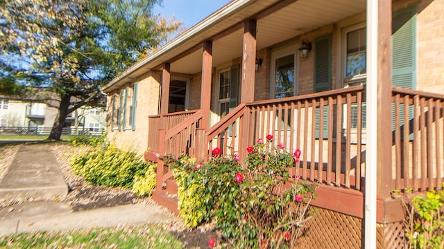 view of home's exterior featuring a porch