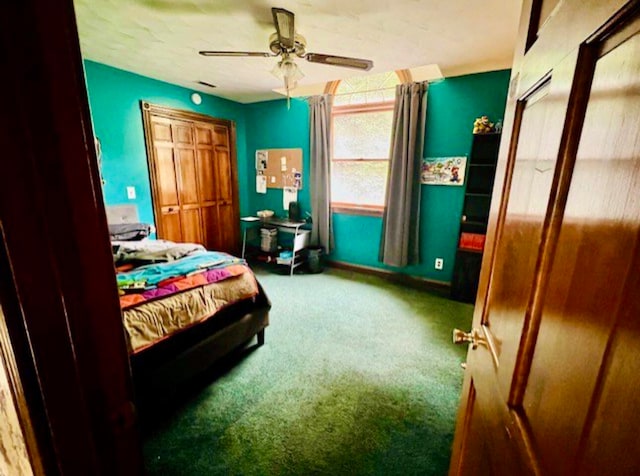 carpeted bedroom with ceiling fan